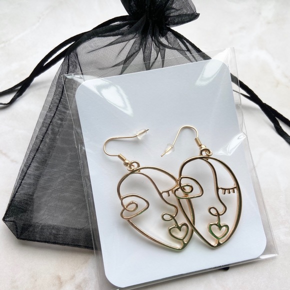 3/$20 Picasso Face Earrings - Picture 2 of 2